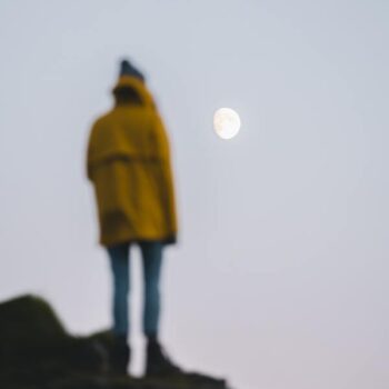 Blur pic of a person looking to the moon
