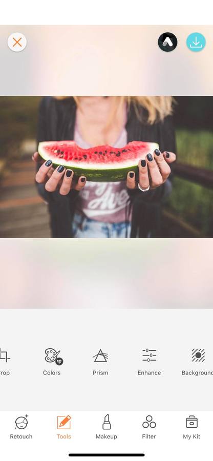 hands holding a watermelon