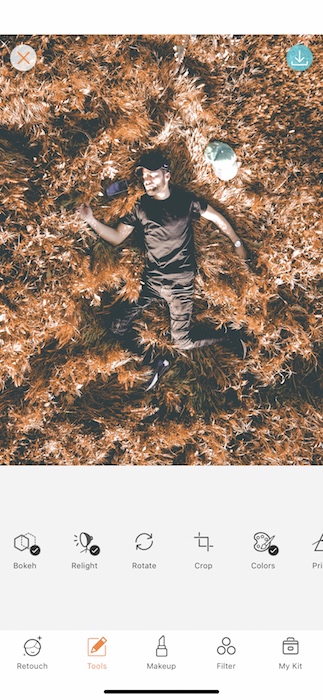 Picture of a guy lay down in a dry grass