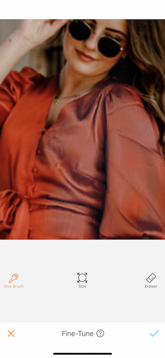 closeup of woman wearing orange dress and sunglasses