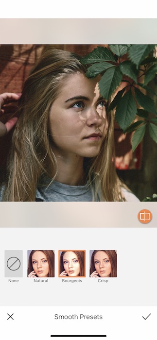 Picture of a blonde girl with plants in her eyes being edited by AirBrush
