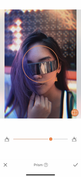 Picture of a woman with intergalactic glasses being edited by AirBrush with Prism