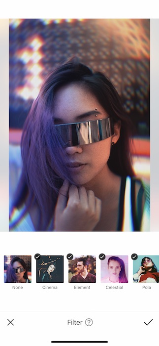 Picture of a woman with intergalactic glasses being edited by AirBrush with Filter