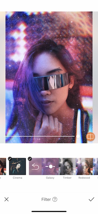 Picture of a woman with intergalactic glasses being edited by AirBrush with Filter