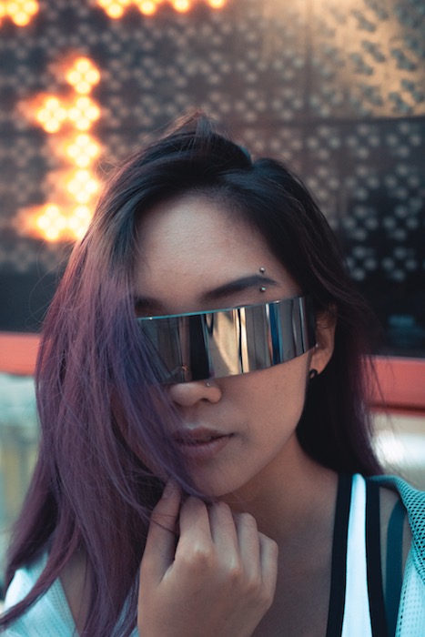 Picture of a woman with intergalactic glasses