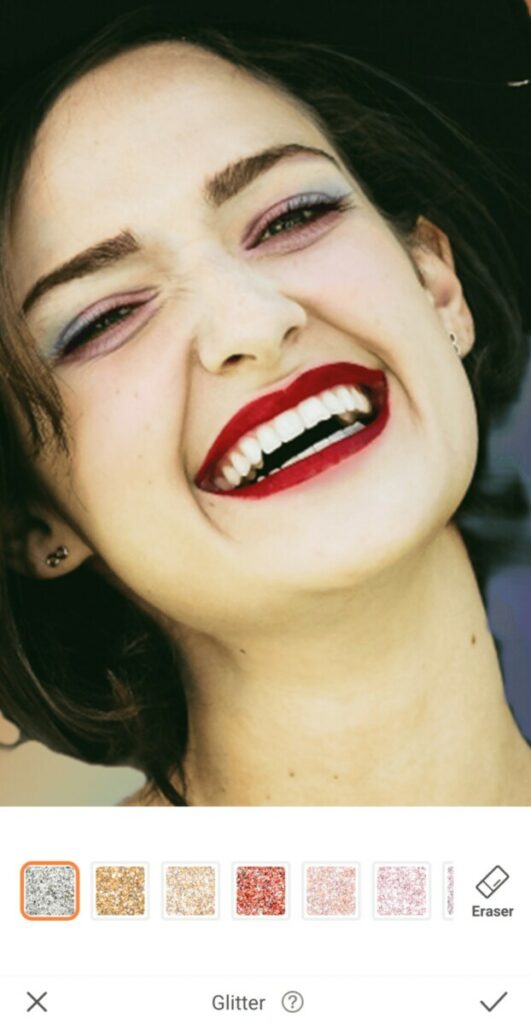 closeup of a laughing woman with red lipstick