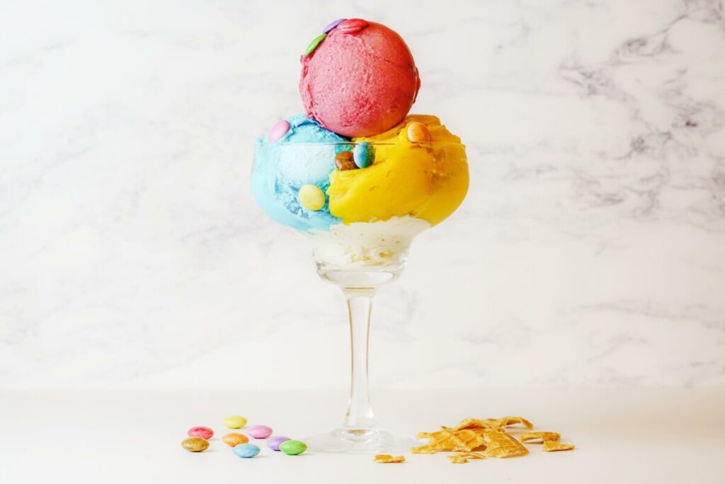 ice cream scoops in a tall glass