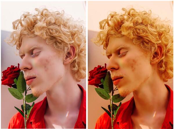 homem loiro segurando uma flor rosa