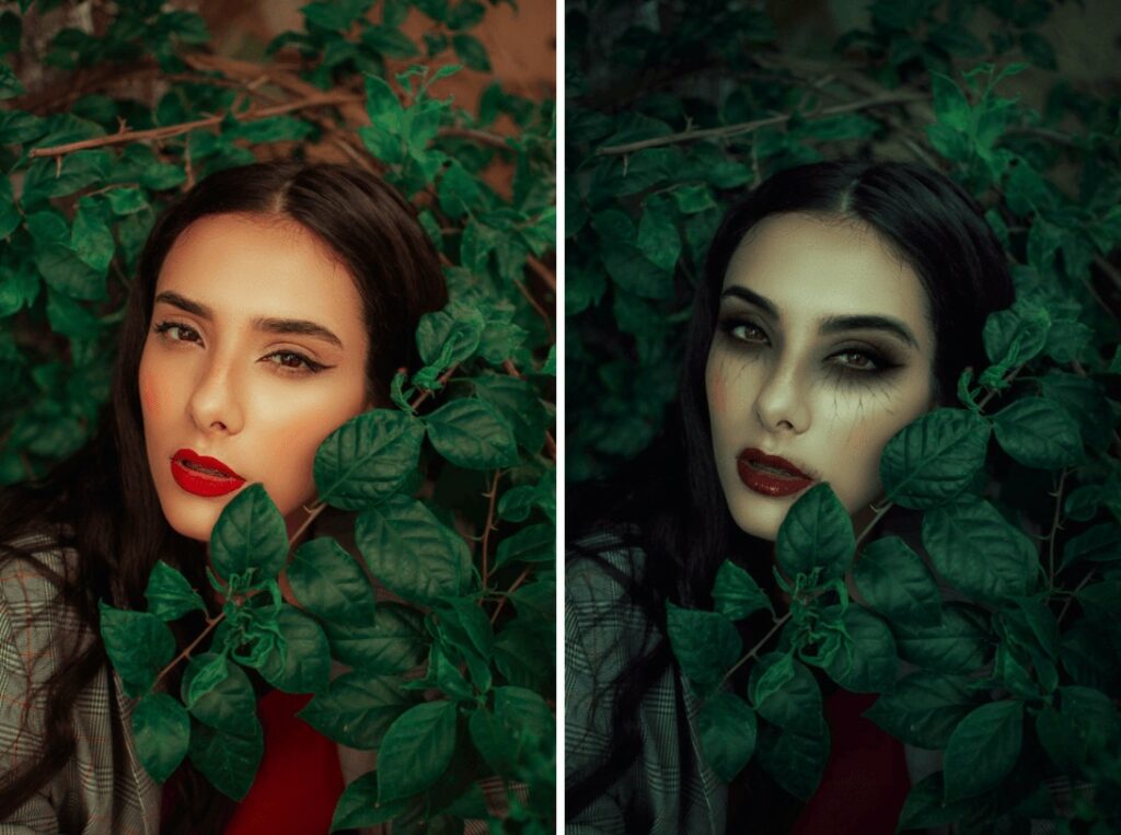 woman wearing vampire makeup hiding between green leaves