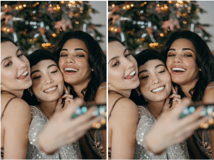 three women in front of christmas tree