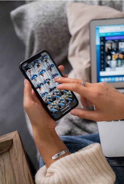 woman holding a cell phone in her hand